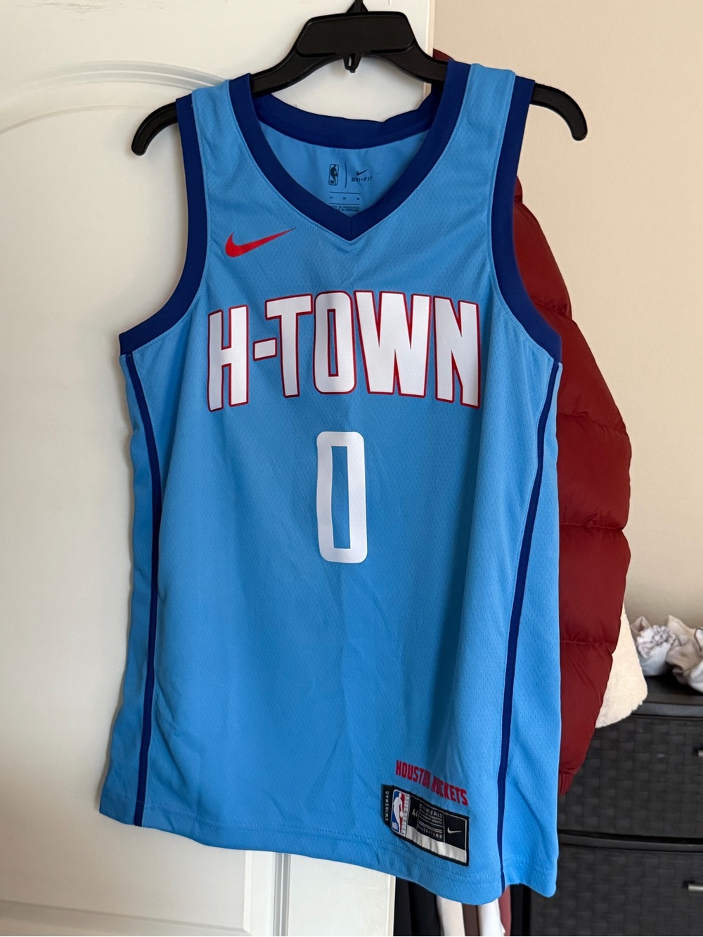 Nike Light Blue Basketball Jersey with Navy and Red Accents